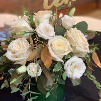 White centerpiece with a touch of gold