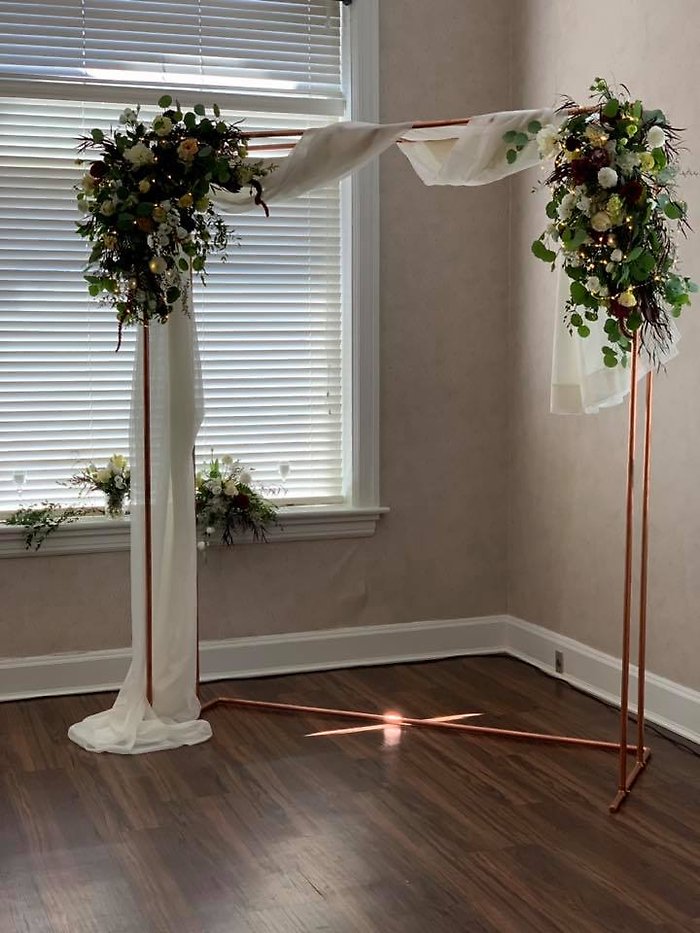 Iron arch floral swags