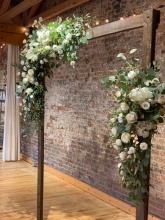 White & gold floral arch swags